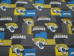 JACKSOVILLE “JAGS ” NFL FABRIC 100% COTTON BRAND NEW DESIGN 1/2 YARD PIECE