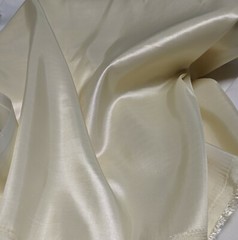 Ivory Taffeta 100% Polyester 59/60″ wide by the yard or roll. Free swatches.