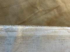 Beige Textured Faux Leather/Suede-Look Upholstery Fabric. Sold by the half yard.
