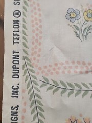 American legacy fabric beige polished cotton w/vines and small flowers 1981