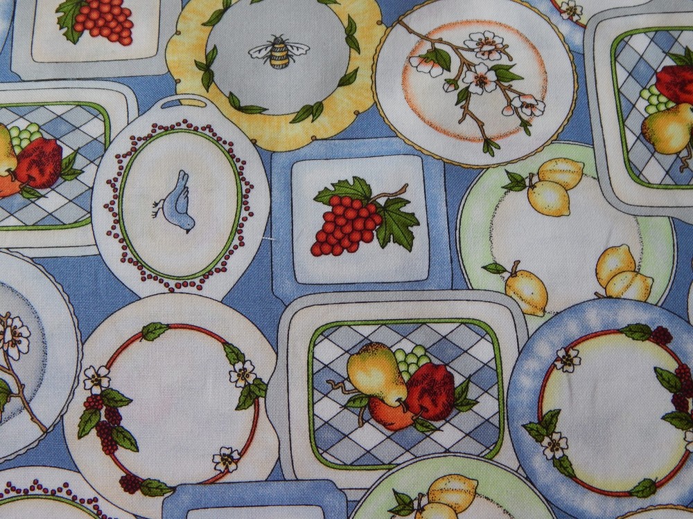BTY “FANCY FRUIT PLATES” ON BLUE BACKGROUND PRINT COTTON FABRIC