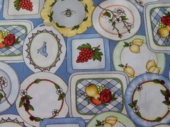 BTY “FANCY FRUIT PLATES” ON BLUE BACKGROUND PRINT COTTON FABRIC