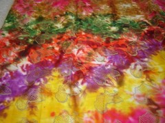 cotton fabric BATIK with gold highlights reds yellows green purple 7 yards