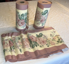 2 rolls ~150 total yds mauve cotton(?) 11″W floral border print fabric, +8 pcs