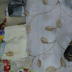 Lot Of embroidered embellishment remnants and fabrics pieces