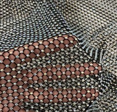 Crystal rhinestones On Black stretch mesh fabric 48” width sold by the yard