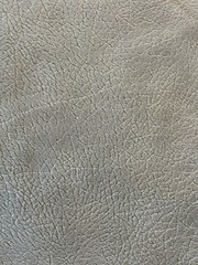 Beige Textured Faux Leather/Suede-Look Upholstery Fabric. Sold by the half yard.