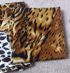 2 unused satin/silky fabrics. Tiger & Leopard Print. 2 Cuts over 2 yards.