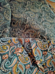 FABRIC REMNANTS LIGHT WEIGHT COTTON BROWN/ORANGE PAISLEY 3 YDS X 56″