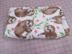 Fleece Fabric – Sloths on Cream 33″ x 51″ and Animals/ABC on Cream 26″ x 62″
