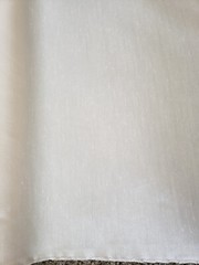 Drapery Fabric 54″ x 7.5 yds on Roll Ivory w/Texture Unused