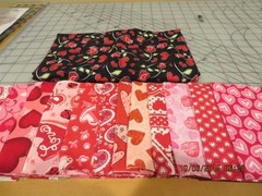 14 PIECES OF 21″ X 5″ F ABRIC PLUS ONE YARD OF FABRIC—-# T 7A-19
