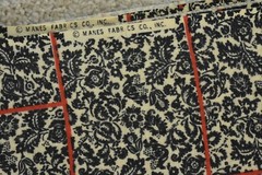 By 1/2 Yd, Vintage, Black Calico with Red on Tan Brushed Cotton/Manes, P2628