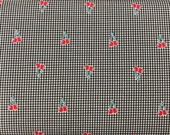 Cherries on black and white mini-check gingham 60″ wide polyester cotton