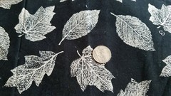 COTTON FABRIC TAN LEAVES ON BLACK/GREEN BY JOHN KALDOR – BTY