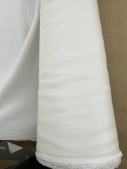 100% Silk heavy crepe , light Ivory color, 55”W, sold by yard