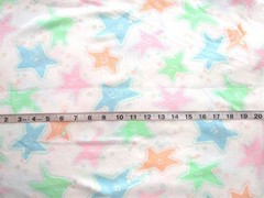 1 yd x 62″ Knit Fabric One-Way Stretch, White with Pink Blue Green Orange Stars
