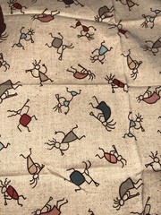 VTG Novelty Folk Art Kokopelli Figures Tossed on Beige Remnant 19″x14″ +