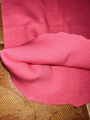 2.1yd (77″)Lx41″W coral pink thin ribbed knit synthetic tubed “cottony” fabric