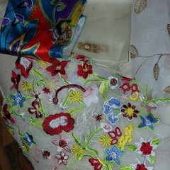 Lot Of embroidered embellishment remnants and fabrics pieces