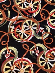 Cotton Fabric Wagon Wheels Avocado Yellow Red Orange on Black 2-7/8Y x 41″ W