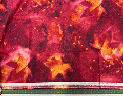 FABRI-QUILT #D108 FALL LEAVES ON MOTTLED RED- COTTON 30″ X 44″(OVER 3/4 YARD)
