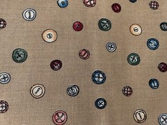 NEW: 1/2 yard x 45″ wide of “BUTTONS” on Tan Fabric