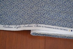 By 1/2 Yd, Cream on Blue Cotton, Thimbleberries/Northern Lights/Jensen, B44