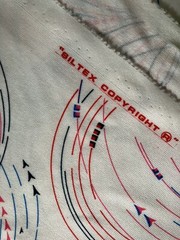 1 yard 60″ wide Vintage Siltex Allover Circle Arrow Pattern red blue black ink