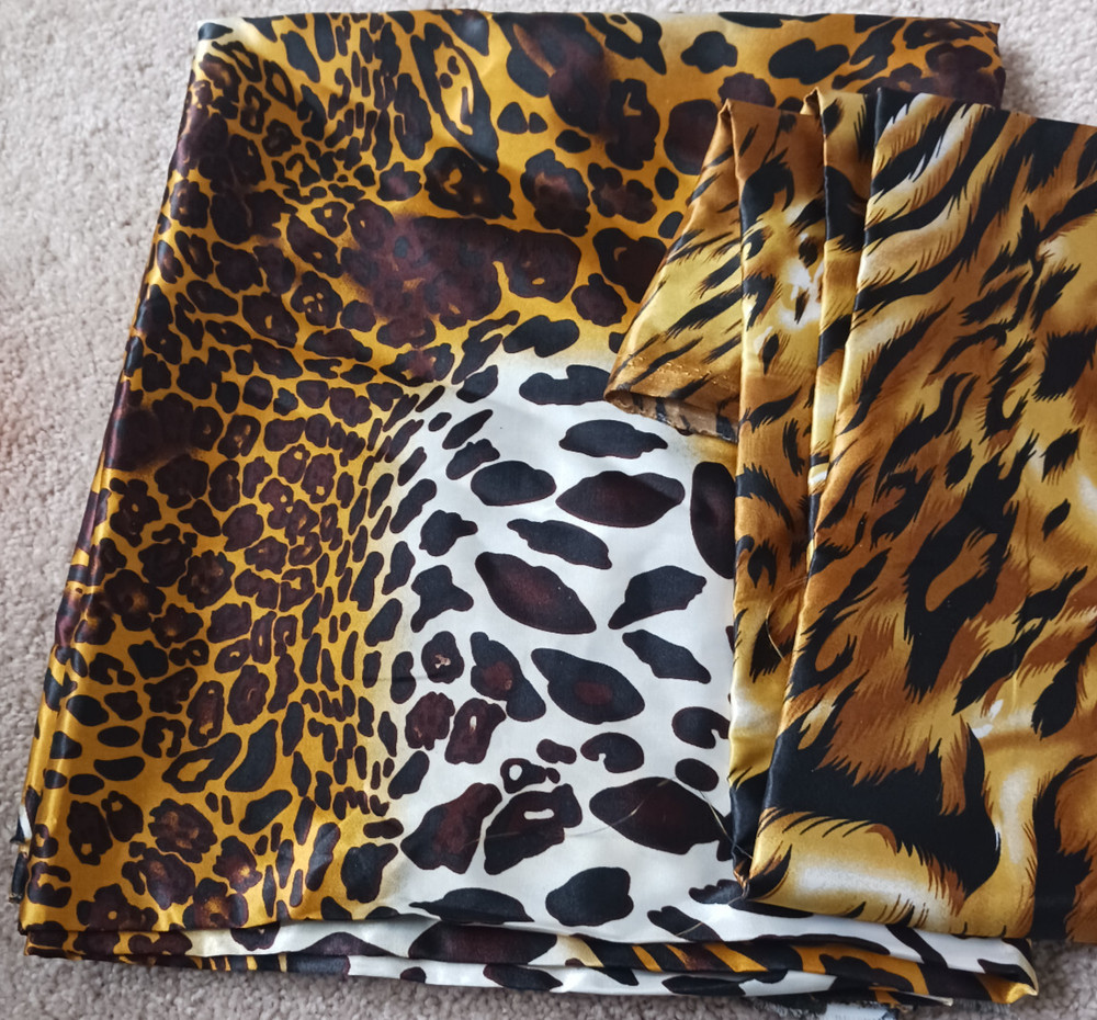 2 unused satin/silky fabrics. Tiger & Leopard Print. 2 Cuts over 2 yards.