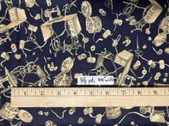 Sewing theme fabric – images: thread, button, scissors, etc- navy/cream – 5/8 yd