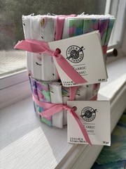 Loops & Threads unicorn-themed fabric bundle: 2 jelly rolls & 1 full yard