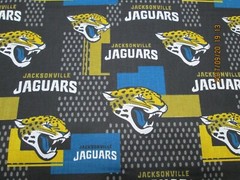 JACKSOVILLE “JAGS ” NFL FABRIC 100% COTTON BRAND NEW DESIGN 1/2 YARD PIECE