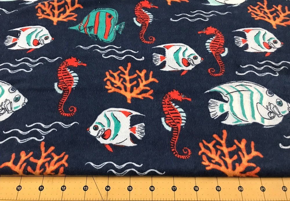Fish Seahorse on Navy Blue Flannel fabric sold by One Yard Cuts #2536