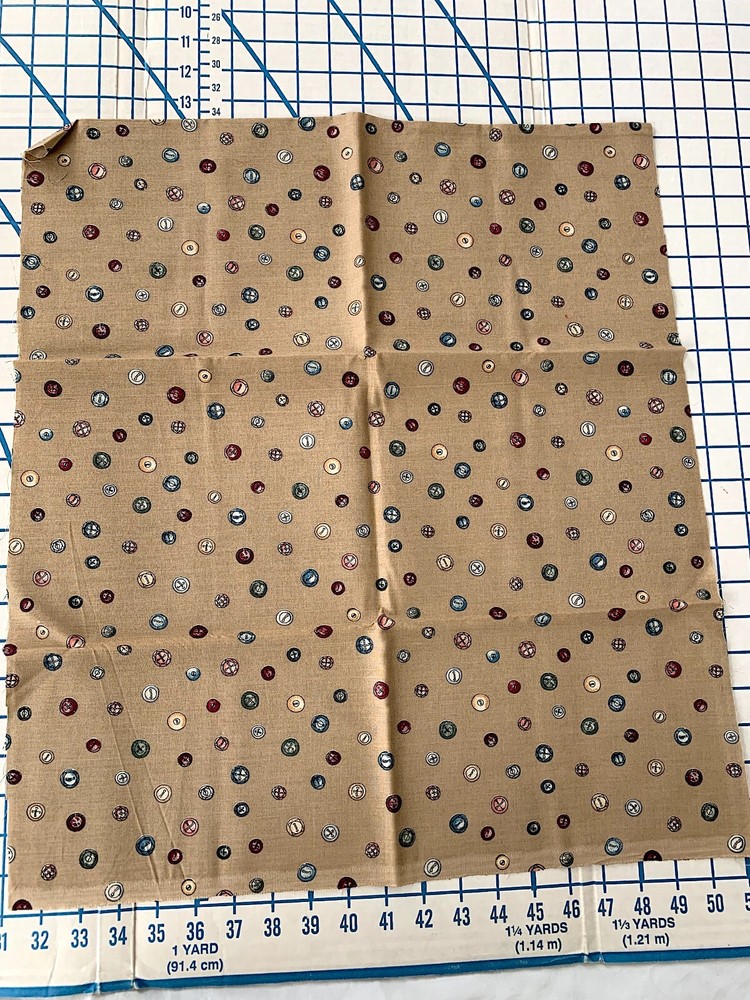 NEW: 1/2 yard x 45″ wide of “BUTTONS” on Tan Fabric