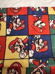 Super Mario Bros Multicolored Cotton Material 60”L – 19” W Material Code 480410