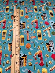 Riley Blake Construction Cranes and Sky Scrappers Cotton Fabric on Blue bt1/2 yd
