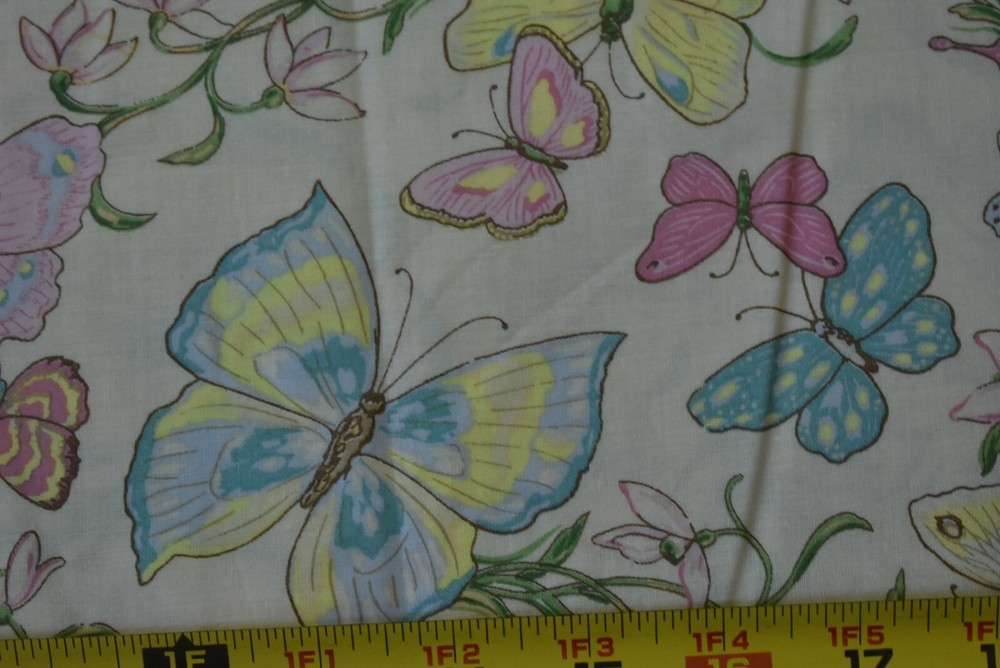 By 1/2 Yd, Pastel Butterflies on Light-Peach Quilt Cotton, P2149