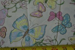 By 1/2 Yd, Pastel Butterflies on Light-Peach Quilt Cotton, P2149