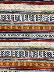 Rayon Stretch Jersey Knit Fabric horizontal Ethnic print Rust/Navy/Cream 9 oz