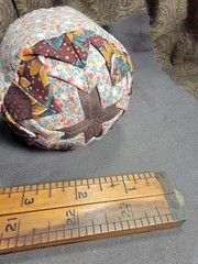 Handcrafted pieced fabric ball star pattern brown gold tones