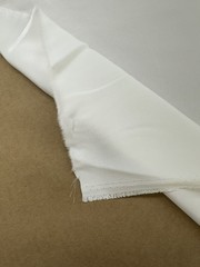 100% Silk heavy crepe , light Ivory color, 55”W, sold by yard
