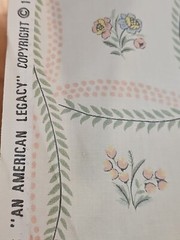 American legacy fabric beige polished cotton w/vines and small flowers 1981