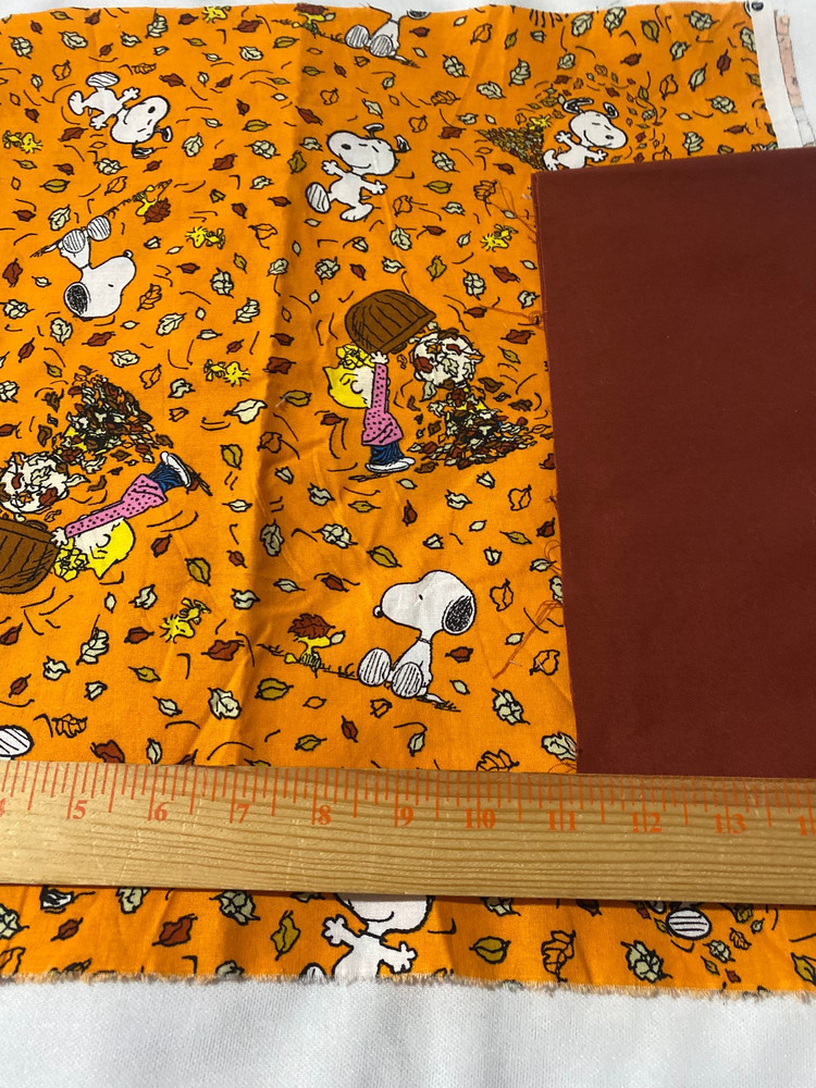 2 pieces cotton fabric /Snoopy & falling leaves 16″ x 38″& solid brown 17 x 44″