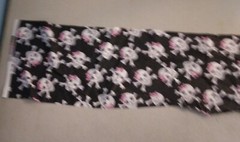 Pink bows on skulls fabric 275795