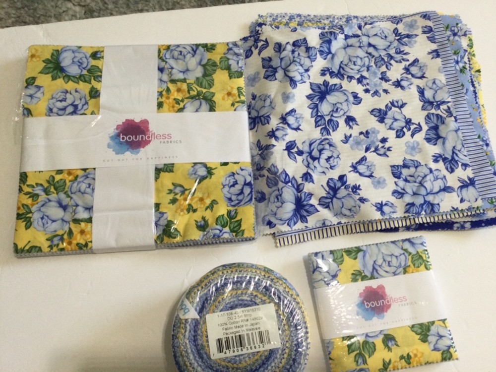 Boundless frabric lot (2) layer cakes, 1 jelly roll and 1 charm pack