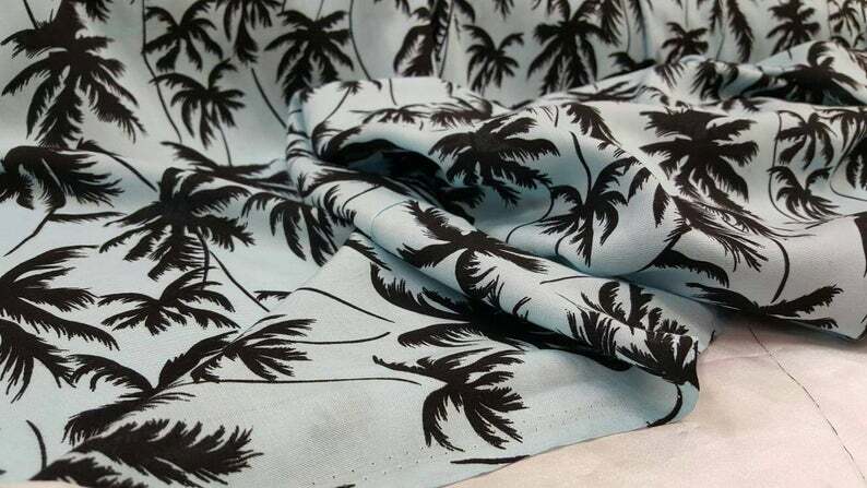100% Rayon challis black Palm tree on baby blue background