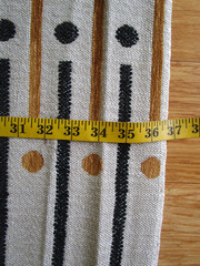 Schumacher’s Serapo Carbon Ochre Black Gold Ivory lines circles modern fabric 1y