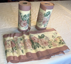 2 rolls ~150 total yds mauve cotton(?) 11″W floral border print fabric, +8 pcs