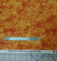 Northcott Studios Textures Sponge Marble Orange Cotton Fabric